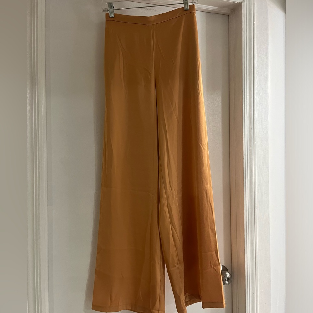 Wide leg satin trouser.